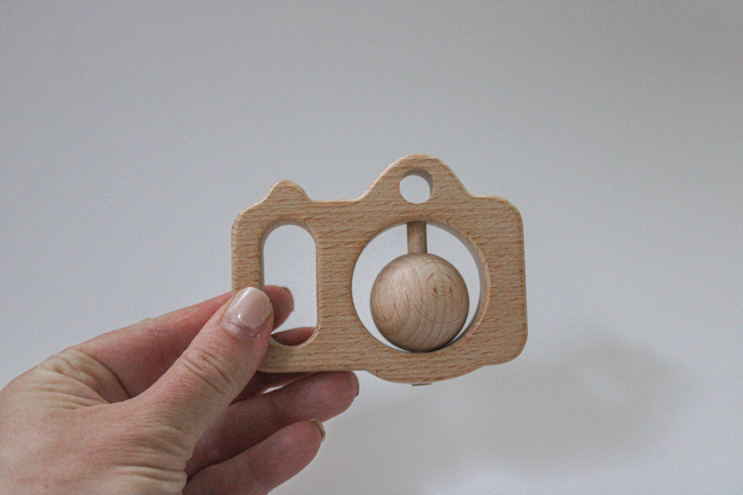 Wooden Rattle - Camera