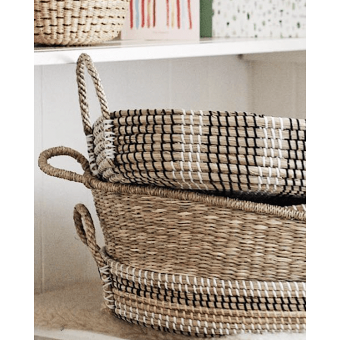 Monochrome wicker changing basket including mattress